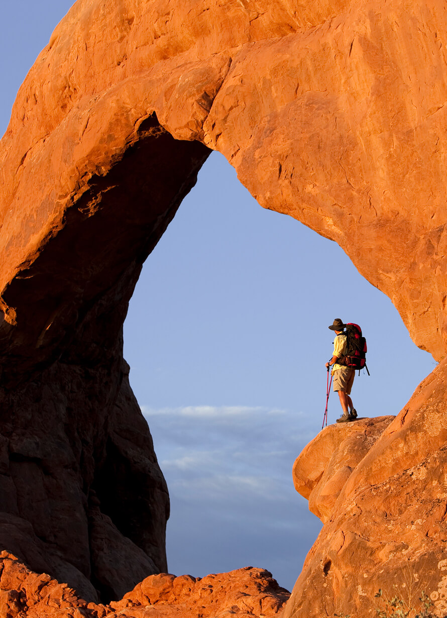 Hiker on a rock cliff